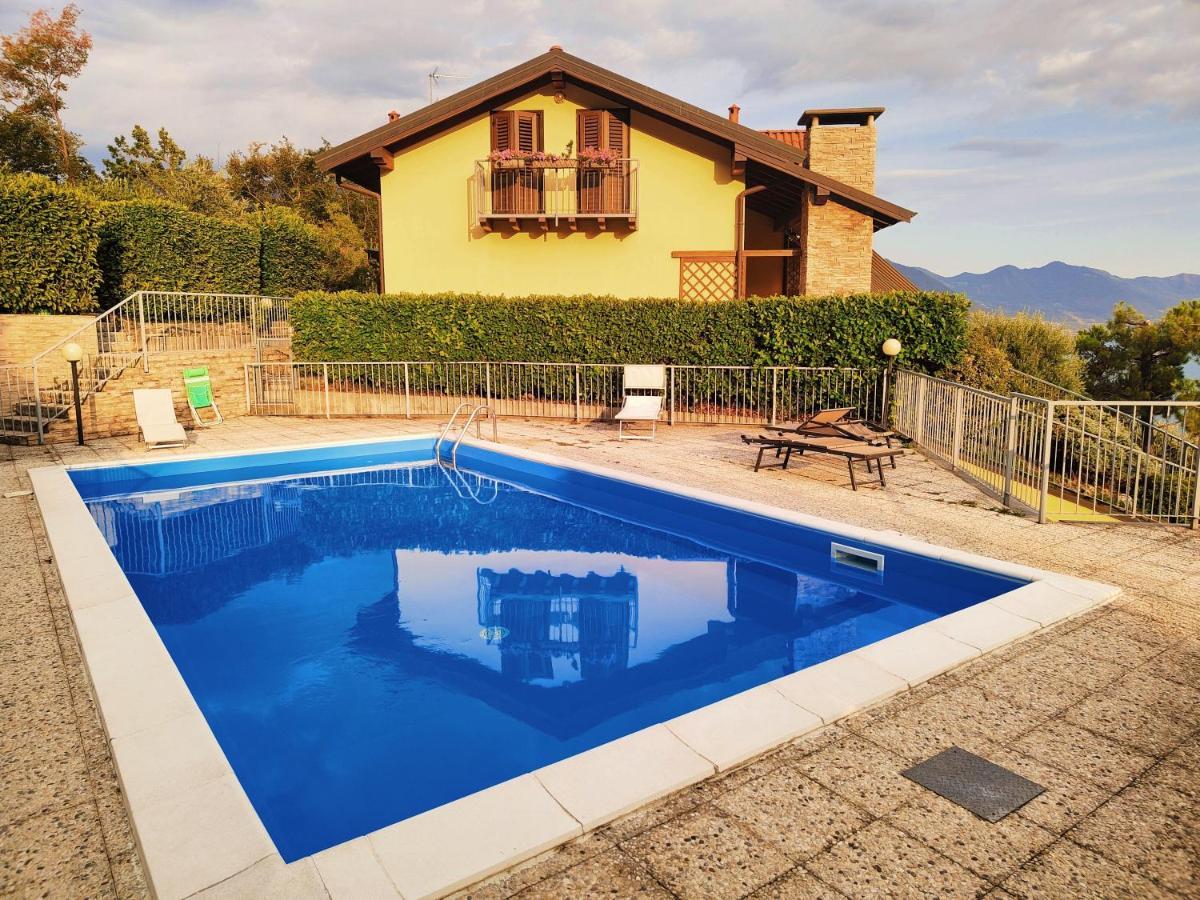 Happy Guest Apartments - Lake Panorama & Pool Riva di Solto Bagian luar foto